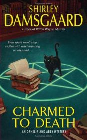book cover of Charmed to Death: An Ophelia and Abby Mystery (Ophelia and Abby Mysteries, Book 2) by Shirley Damsgaard