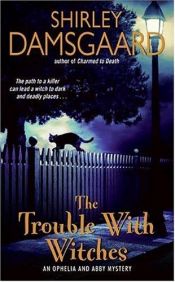 book cover of The Trouble With Witches: An Ophelia and Abby Mystery (Ophelia and Abby Mysteries #3) by Shirley Damsgaard