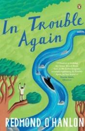 book cover of In trouble again a journey between the Orinoco and the Amazon by Redmond O'Hanlon
