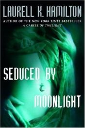 book cover of Seduced by Moonlight by Laurell K. Hamilton