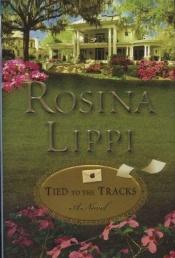 book cover of Tied to the Tracks by Rosina Lippi