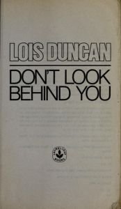 book cover of Don't look behind you by Lois Duncan
