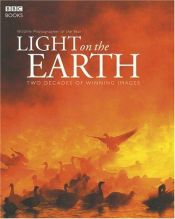 book cover of Light on the Earth by David Attenborough
