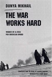 book cover of The war works hard = al-Ḥarb taʻmalu bi-jid by Dunya Mikhail