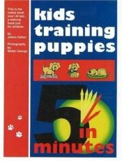 book cover of Kids Training Puppies in 5 Minutes with DVD by JoAnn Dahan