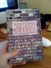 book cover of Restless Cities by Matt Beaumont