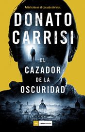 book cover of El cazador de la oscuridad by Donato Carrisi